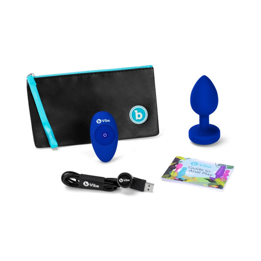 b-Vibe Vibrating Jewel Rechargeable Remote-Controlled Anal Plug with Gem Base Blue Sapphire L/XL - Red Garter